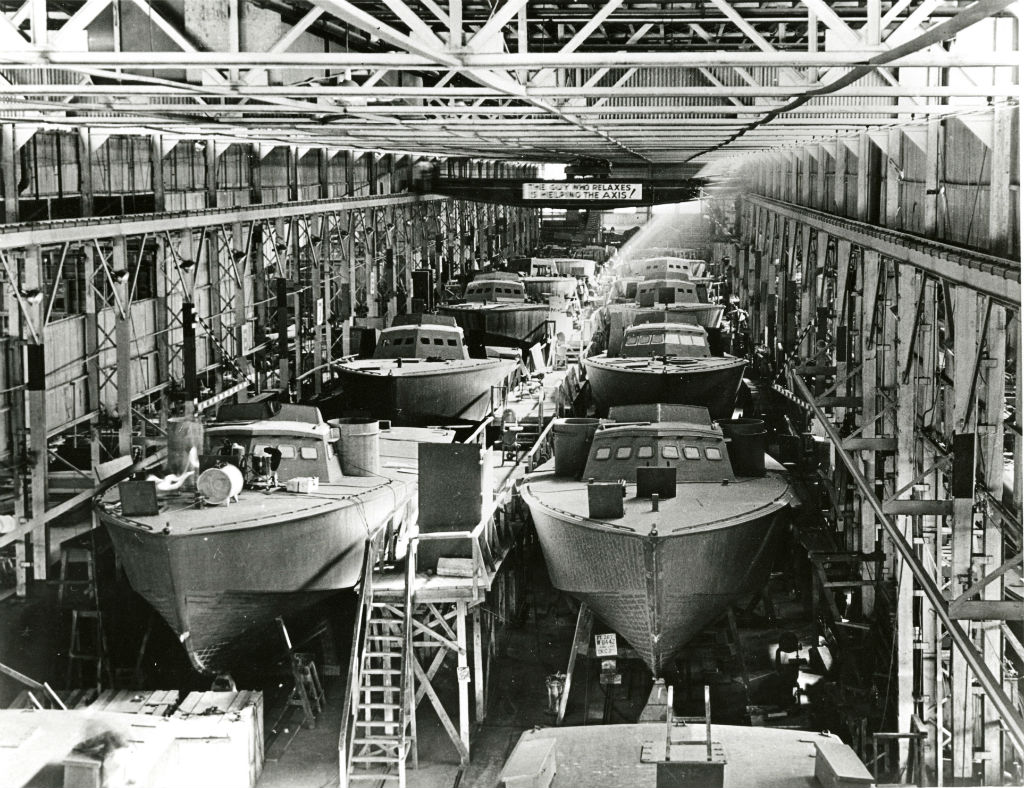 Image: the Higgens factory floor bustles with boatbuilding activity