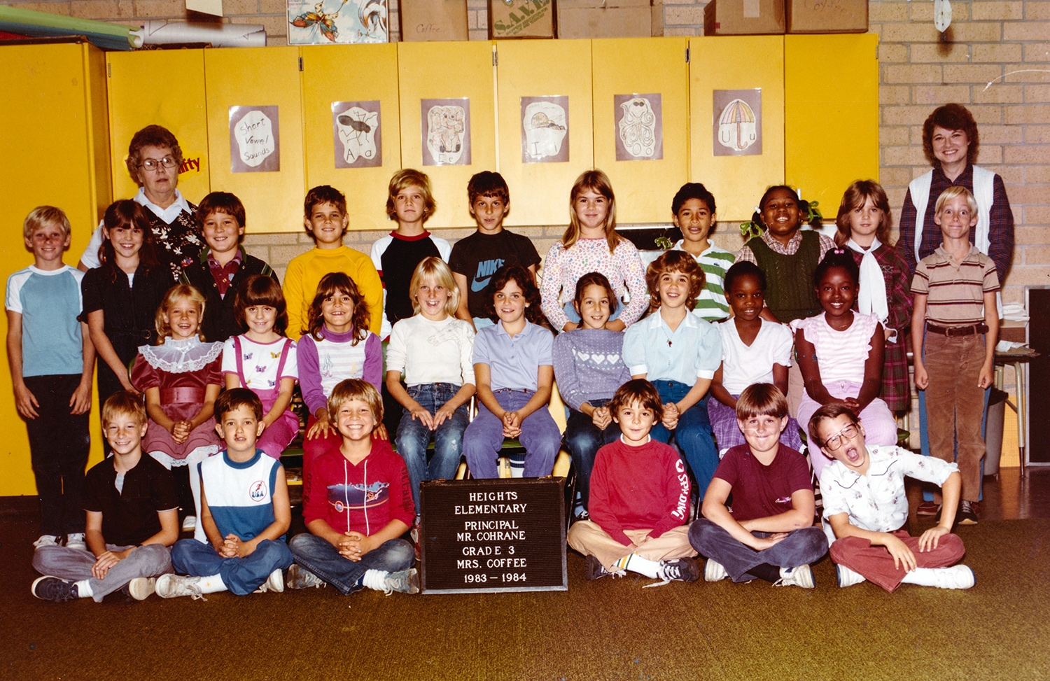 Susann Keohane, in the back, second from right standing directly next to her third grade teacher Mrs. Coffee, back right, and her third grade class in an old school photo.