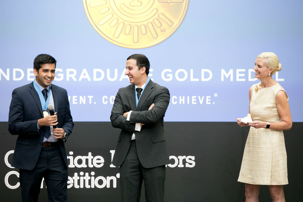 Ameer Shakeel (left) and Payam Pourtaheri (center) accept the 2016 National Inventors Hall of Fame Collegiate Inventors Competition undergraduate gold medal at the USPTO.