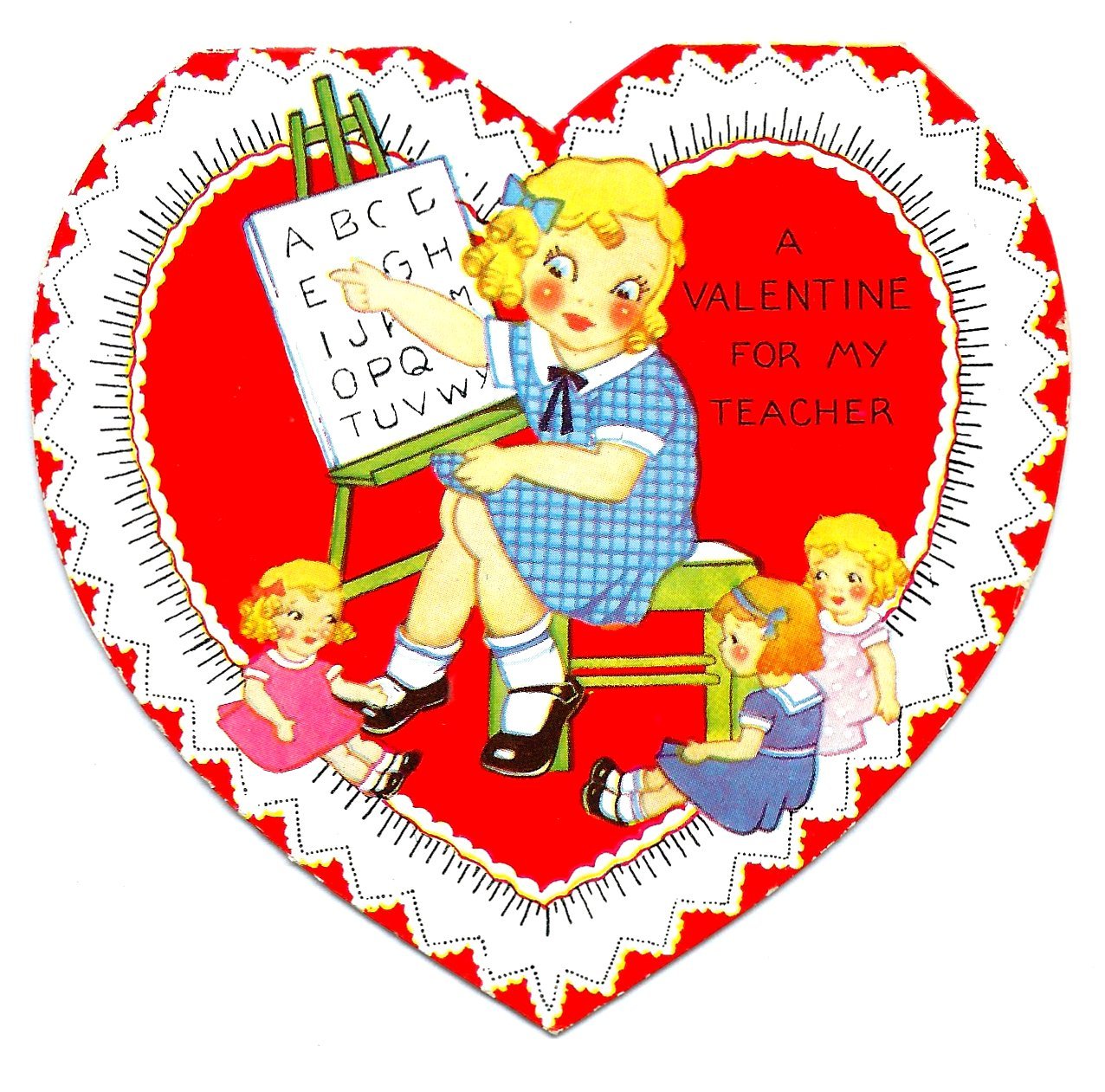 A colorful, heart-shaped vintage valentine of a cartoon girl teaching the dolls at her feet to read by pointing at the letter “A” shown on an alphabet poster. Text reads: “A valentine for my teacher.”