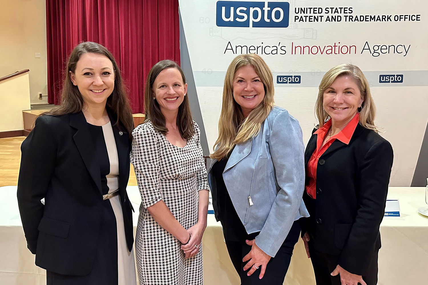 From left to right, Major Squire with the USPTO’s Janine Scianna, senior adviser to Director Kathi Vidal; Director Vidal; and Mary Fuller, the Silicon Valley Regional Office’s director, at an Entrepreneurial Essentials event on October 11 at Marine Corps Base Camp Pendleton